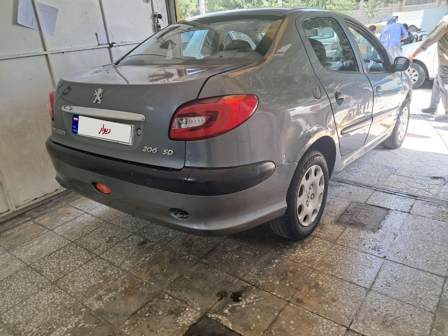 پژو ۲۰۶ صندوق دار v8 - 1394