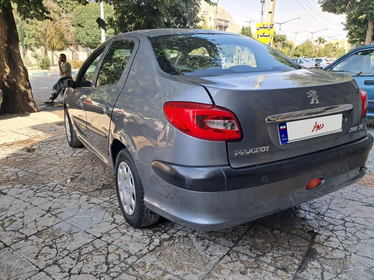 پژو ۲۰۶ صندوق دار v8 - 1394