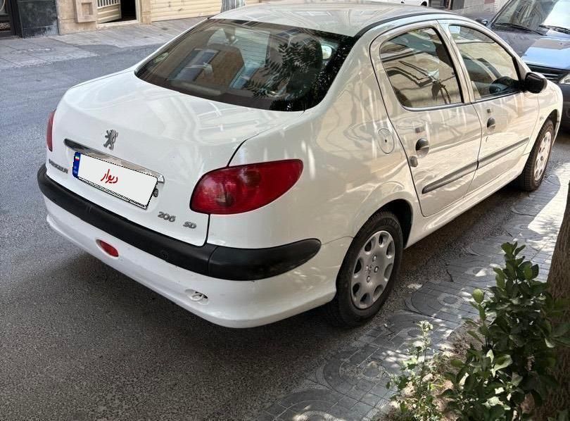 پژو ۲۰۶ صندوق دار v8 - 1395
