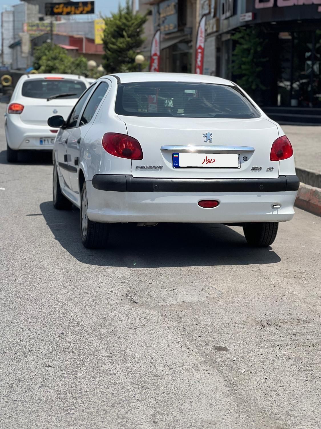 پژو ۲۰۶ صندوق دار v8 - 1396
