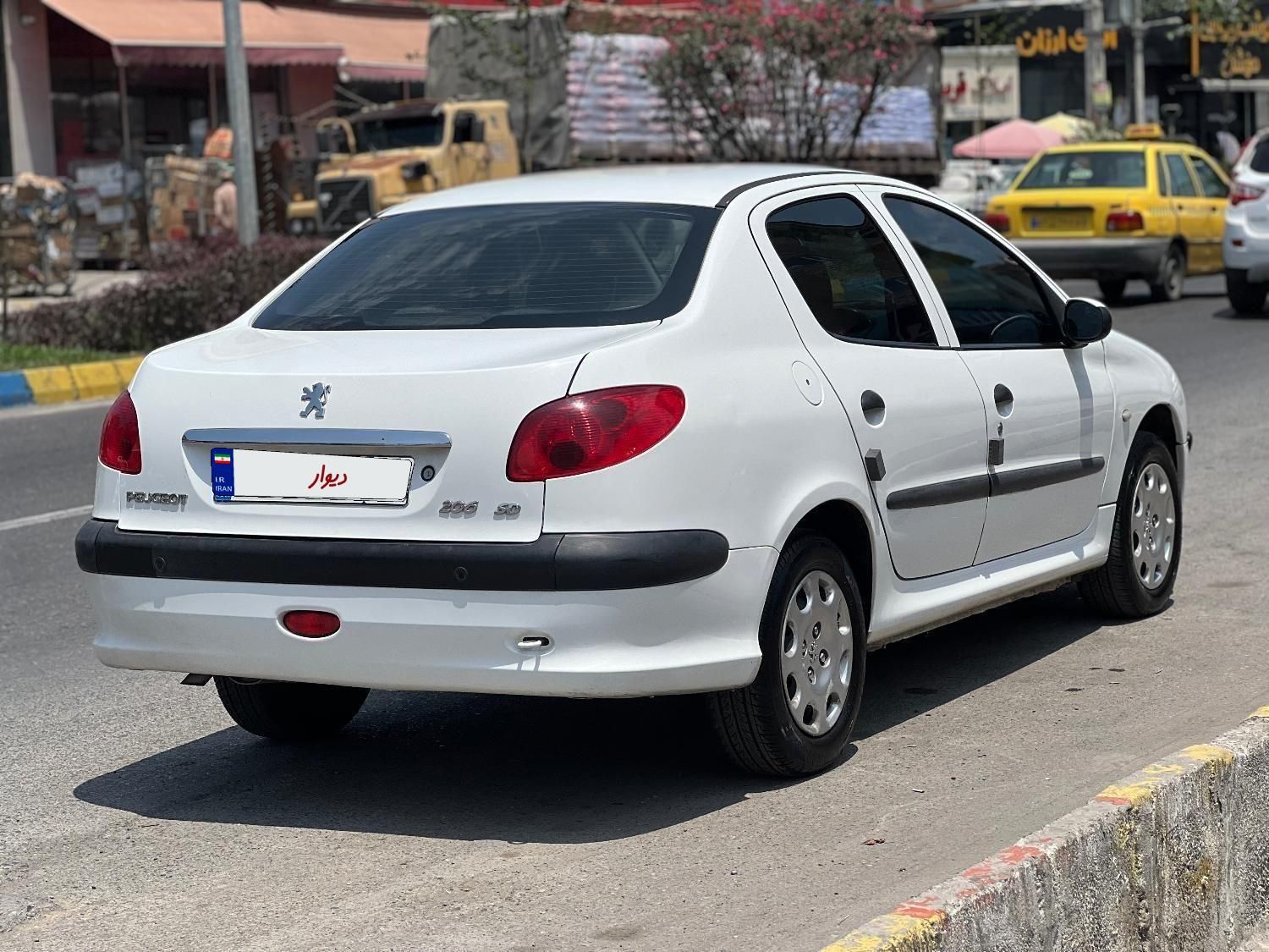 پژو ۲۰۶ صندوق دار v8 - 1396