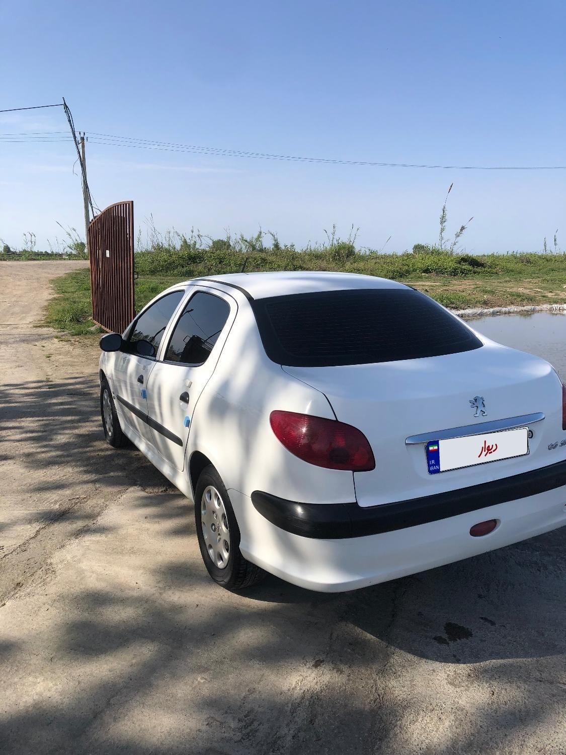 پژو ۲۰۶ صندوق دار v8 - 1394