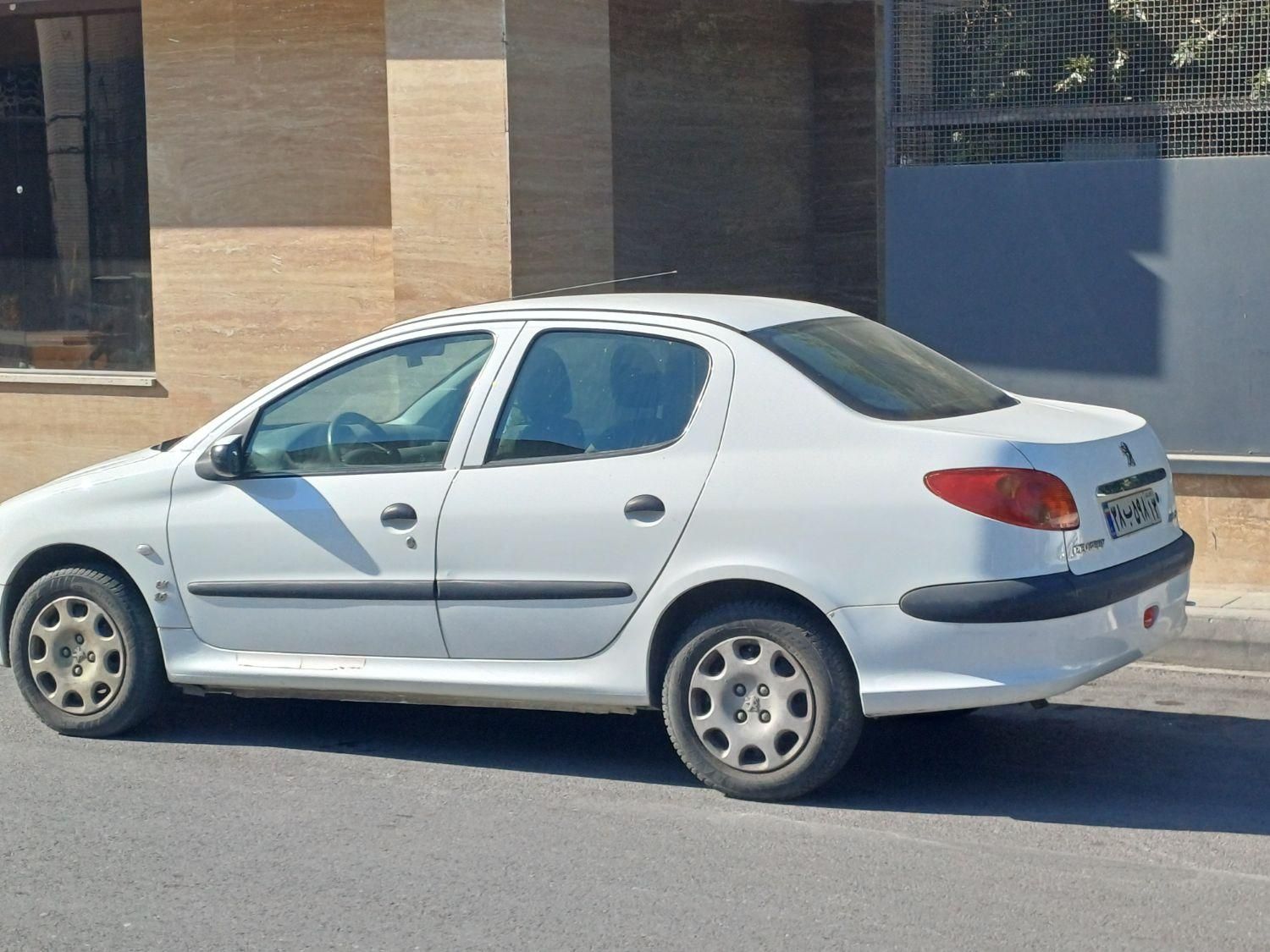 پژو ۲۰۶ صندوق دار v8 - 1393