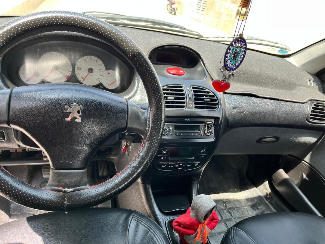 پژو ۲۰۶ صندوق دار v8 - 1396