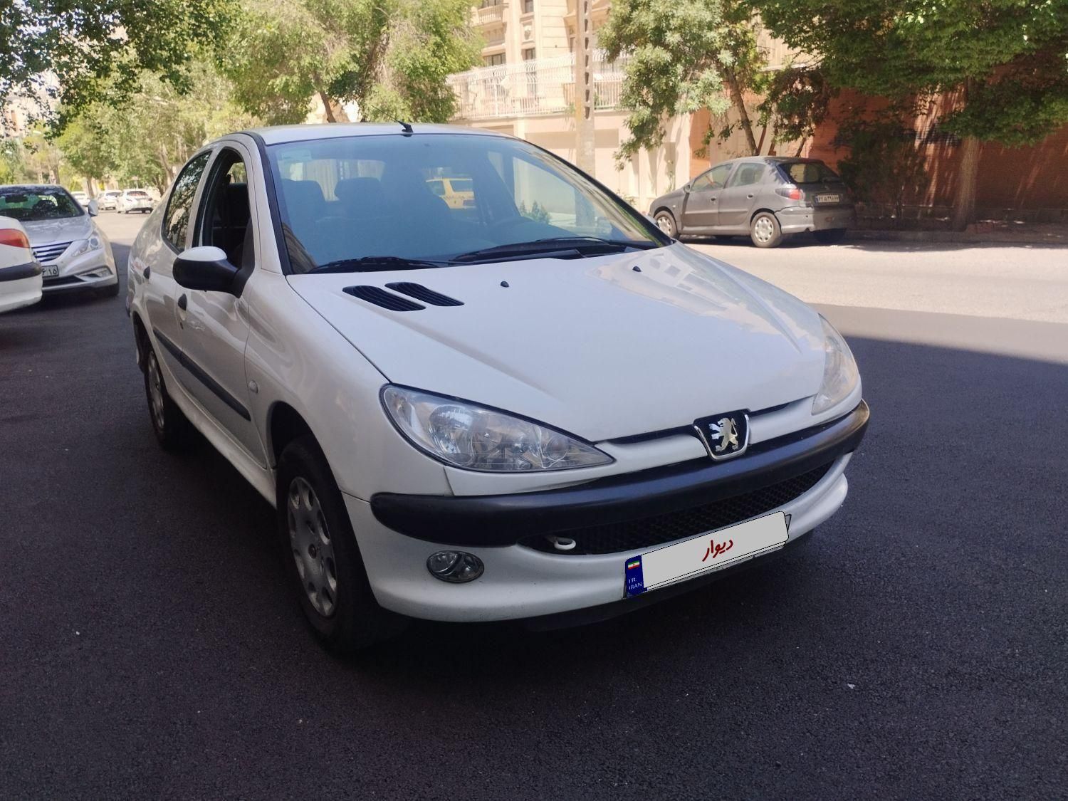 پژو ۲۰۶ صندوق دار v8 - 1395