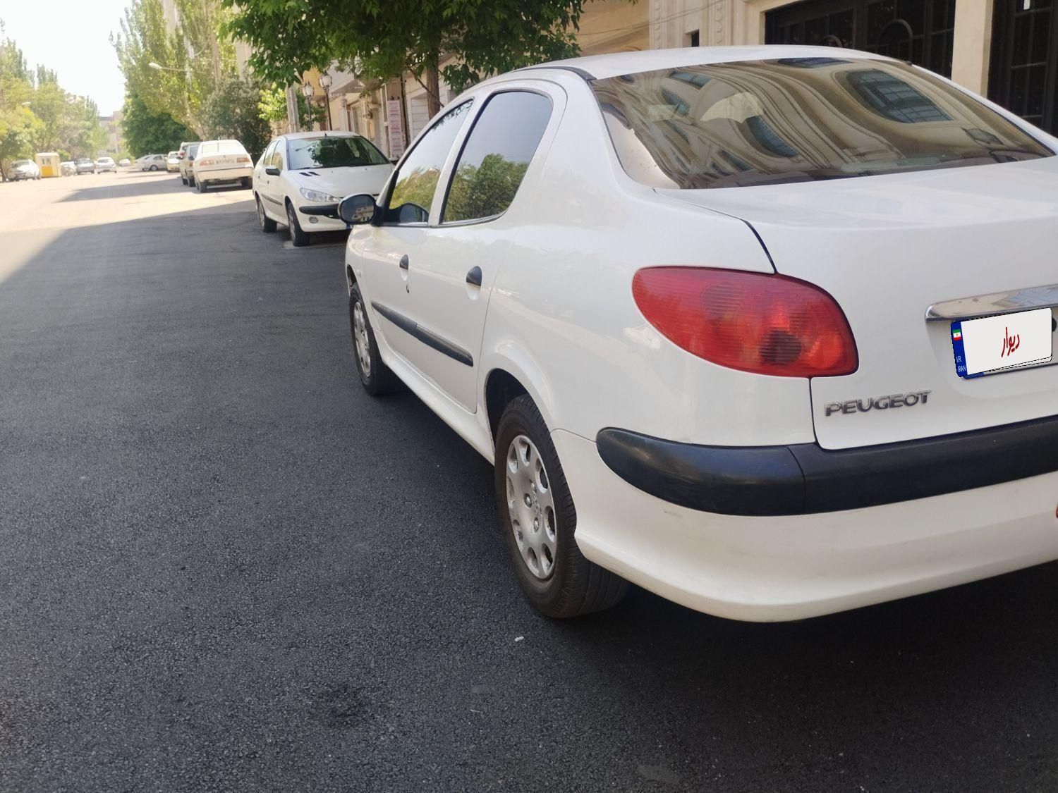 پژو ۲۰۶ صندوق دار v8 - 1395