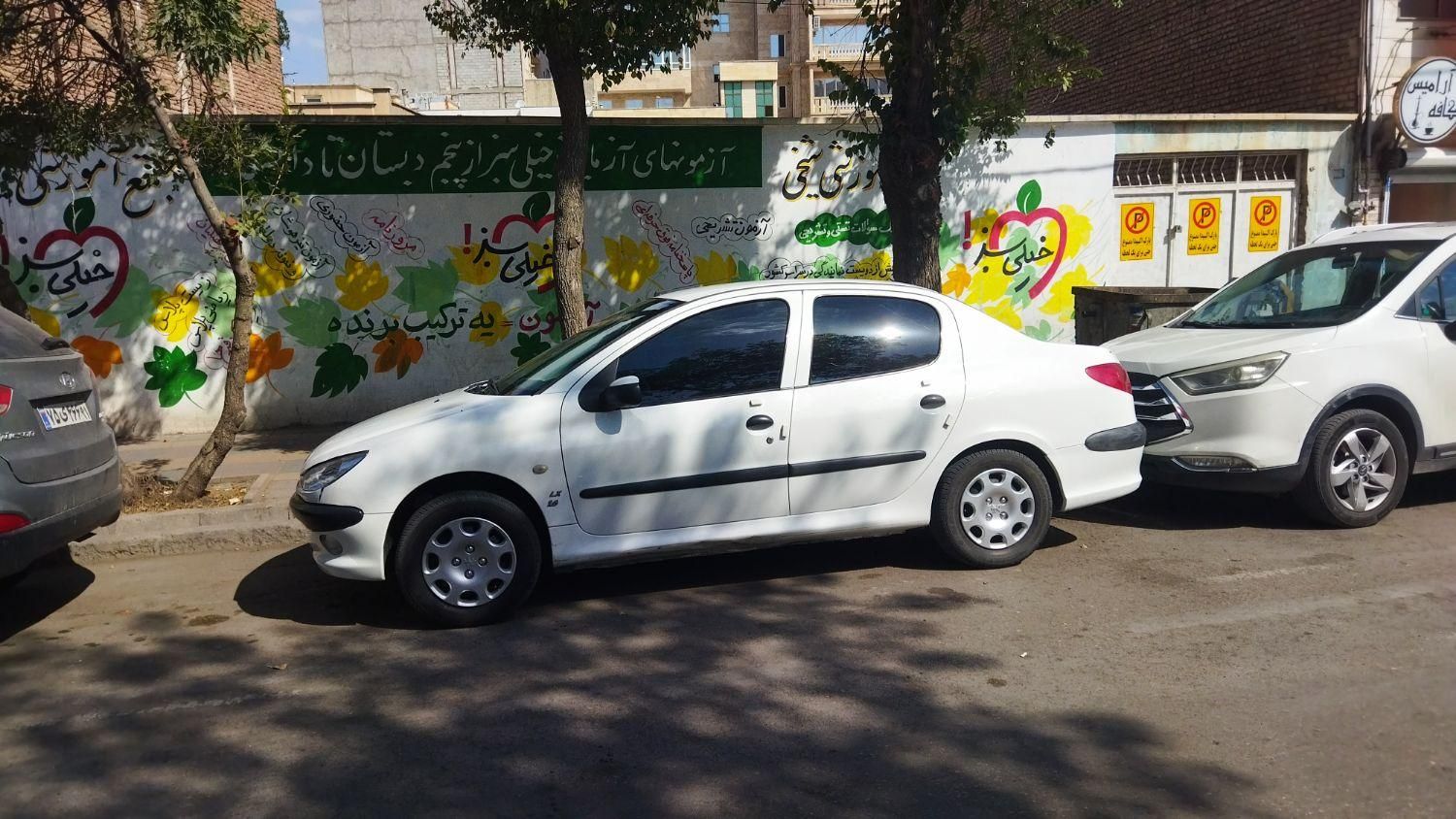 پژو ۲۰۶ صندوق دار v8 - 1396