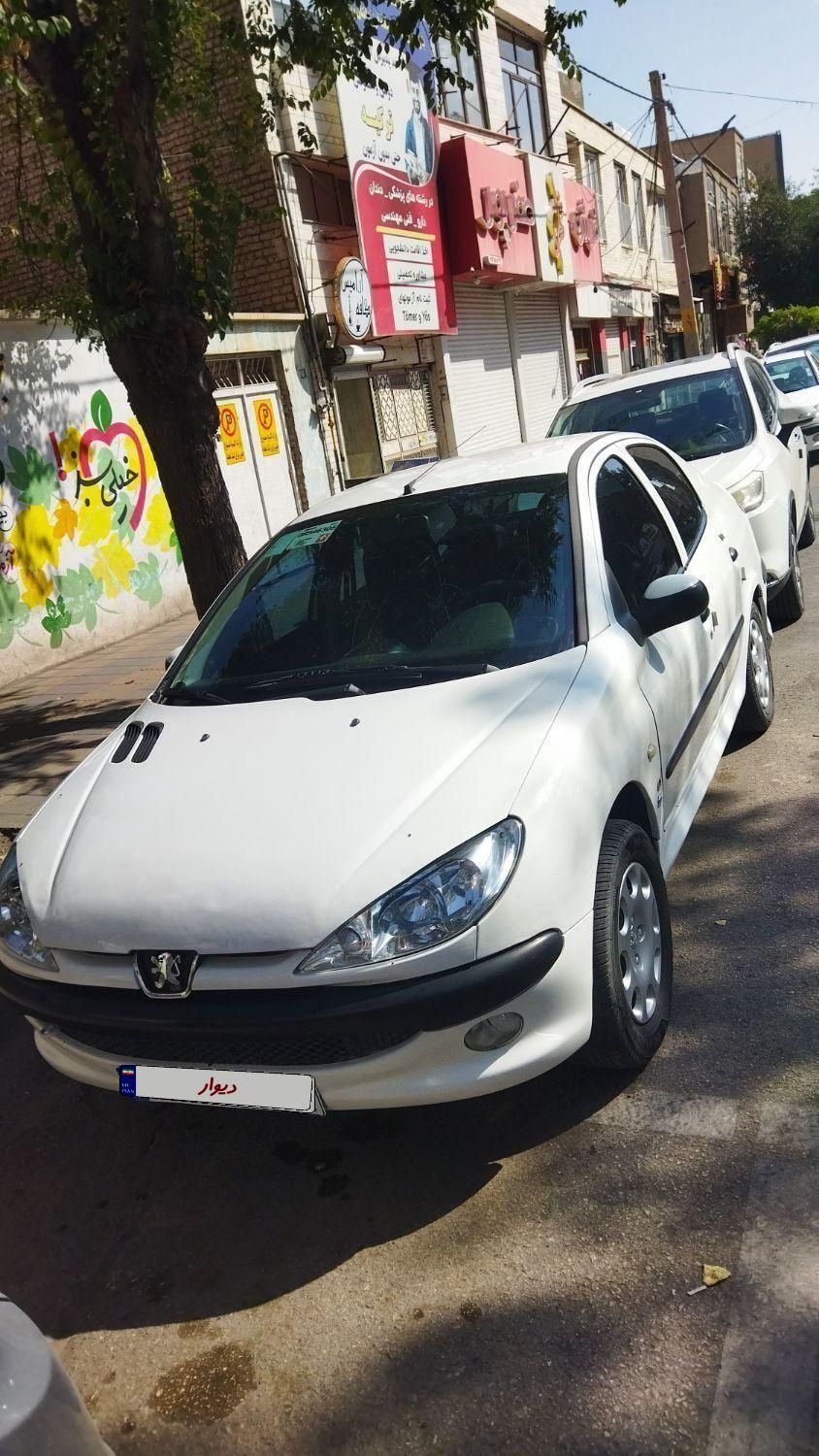 پژو ۲۰۶ صندوق دار v8 - 1396