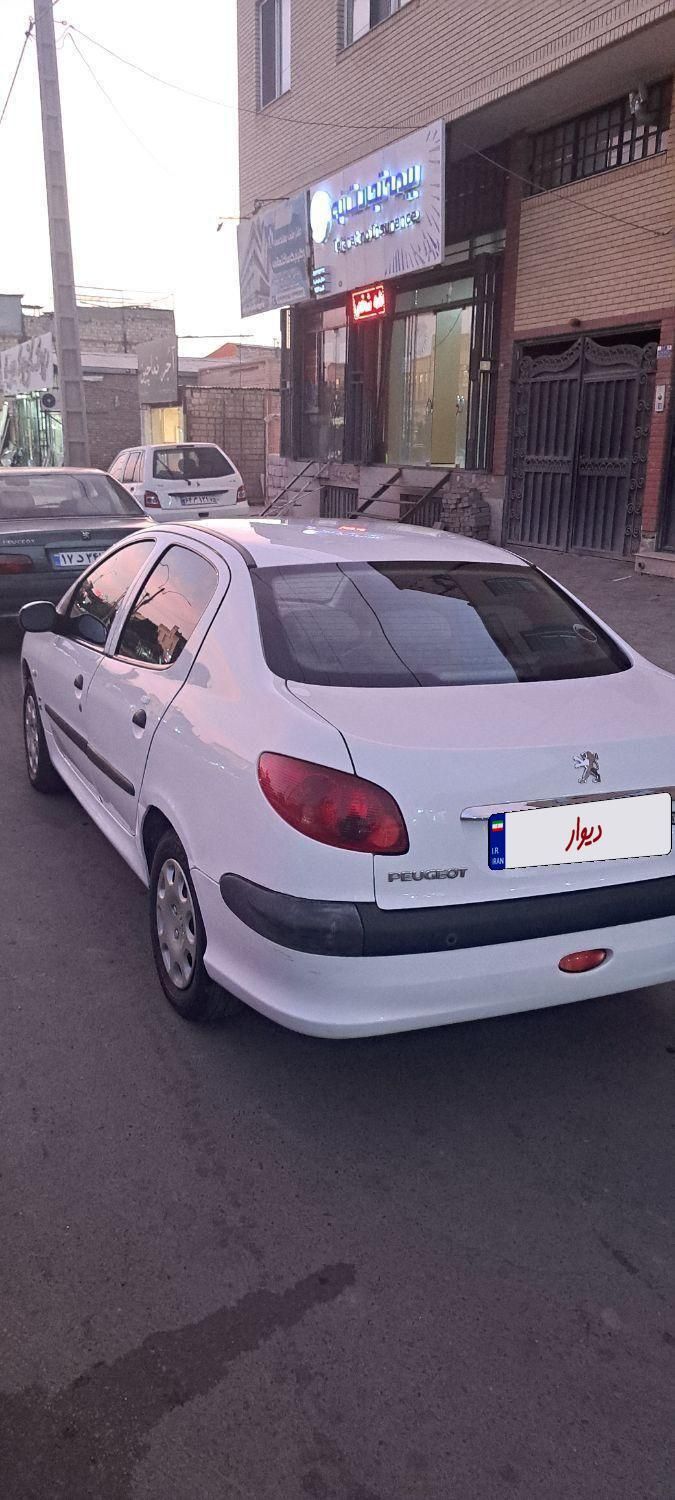 پژو ۲۰۶ صندوق دار v8 - 1396