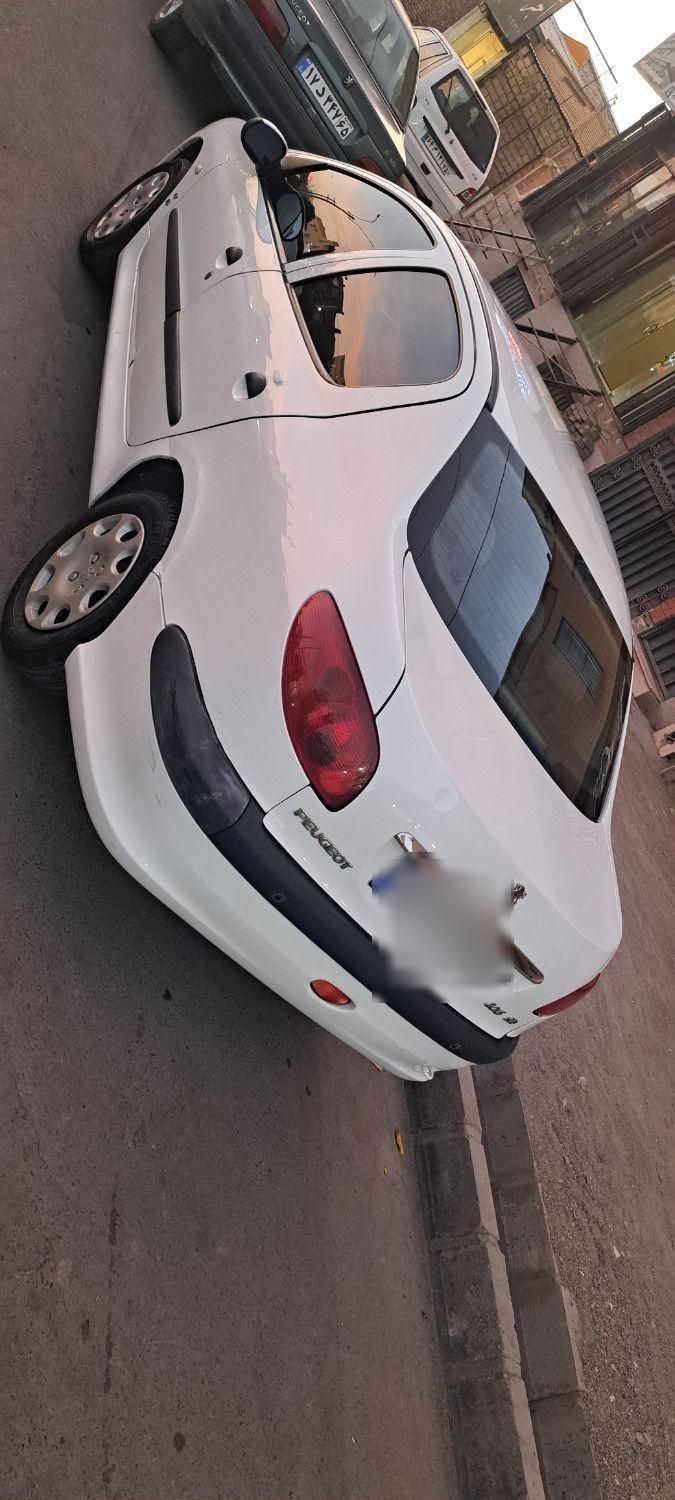 پژو ۲۰۶ صندوق دار v8 - 1396