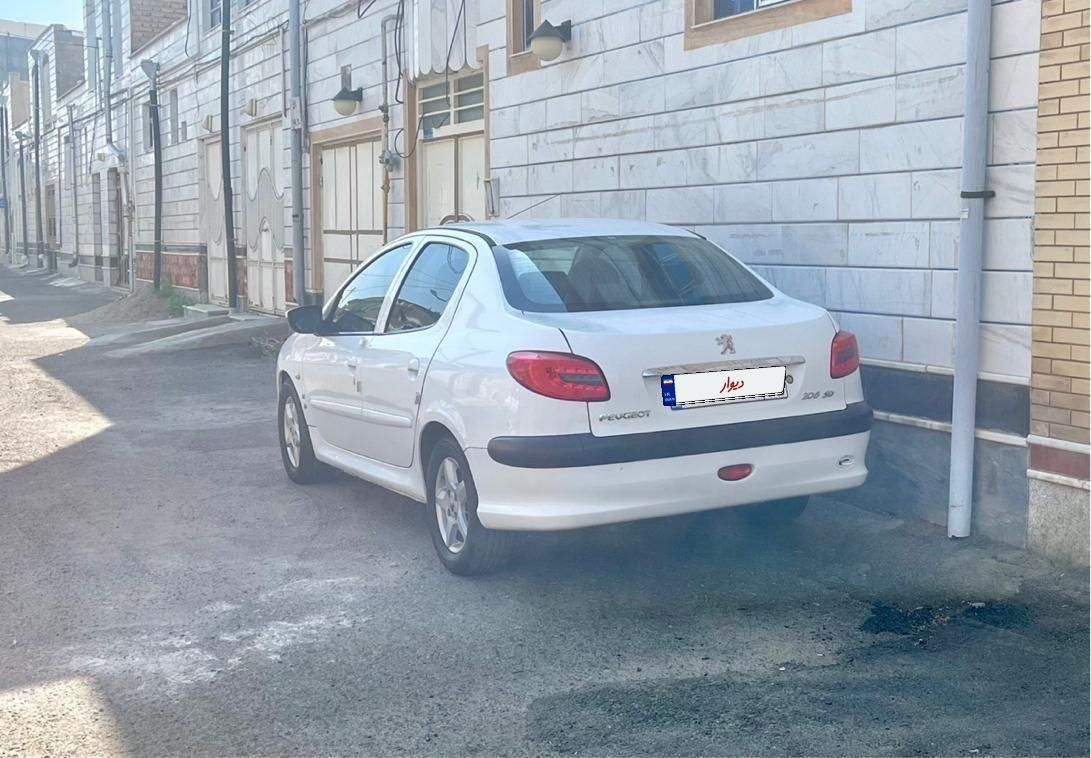 پژو ۲۰۶ صندوق دار v8 - 1396