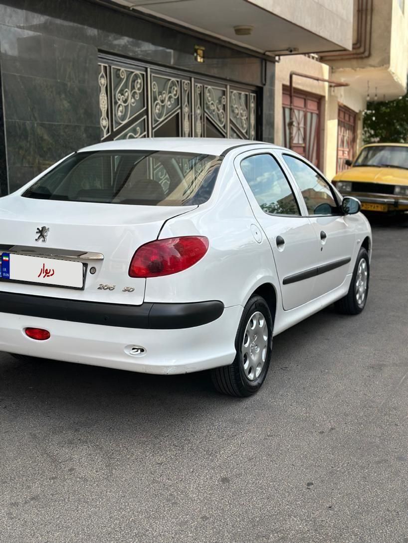 پژو ۲۰۶ صندوق دار v8 - 1396