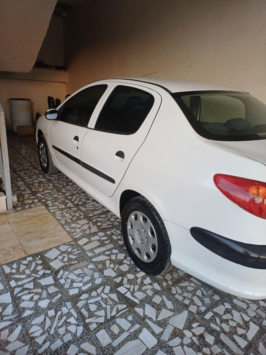 پژو ۲۰۶ صندوق دار v8 - 1391