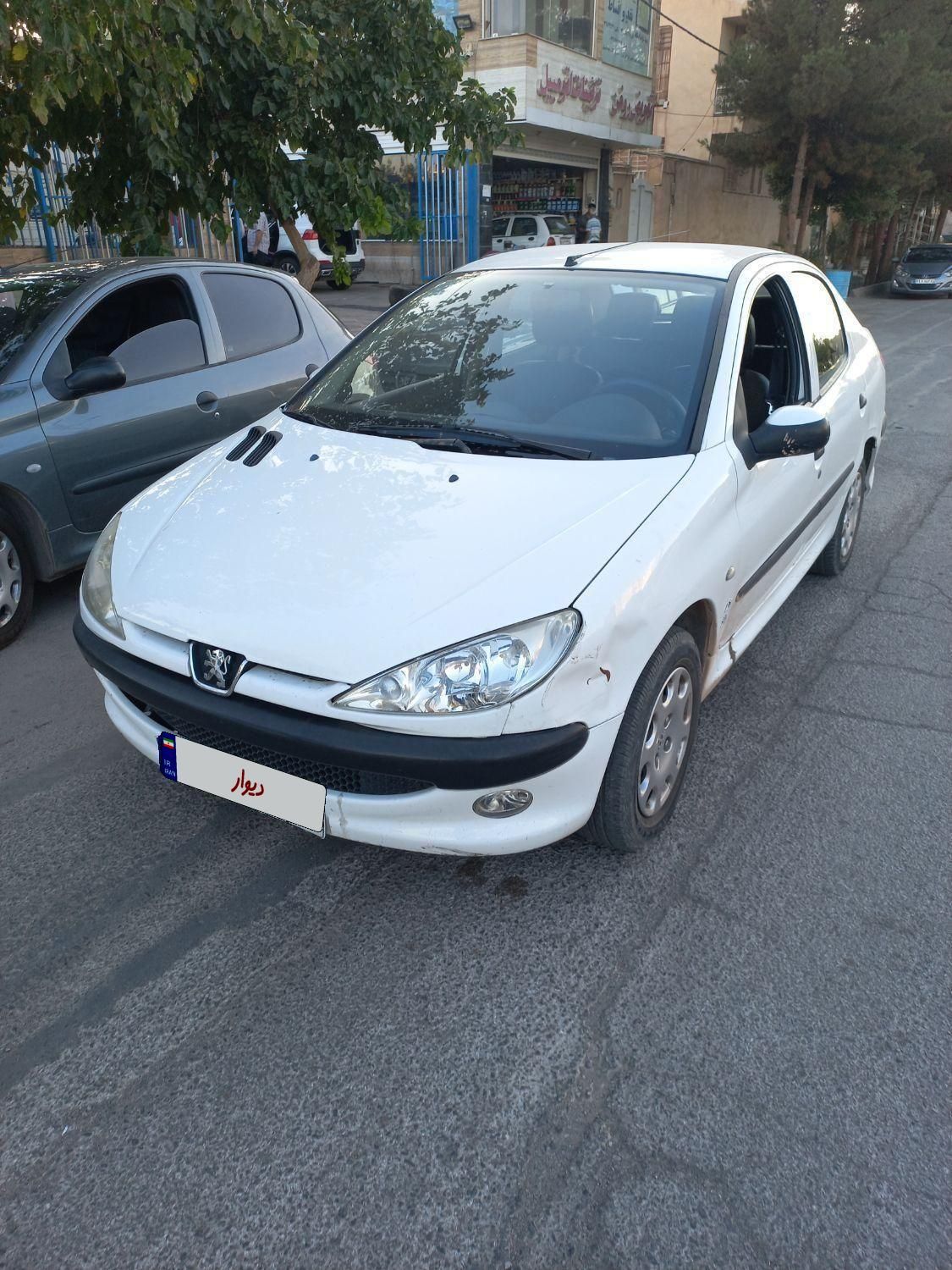 پژو ۲۰۶ صندوق دار v8 - 1396
