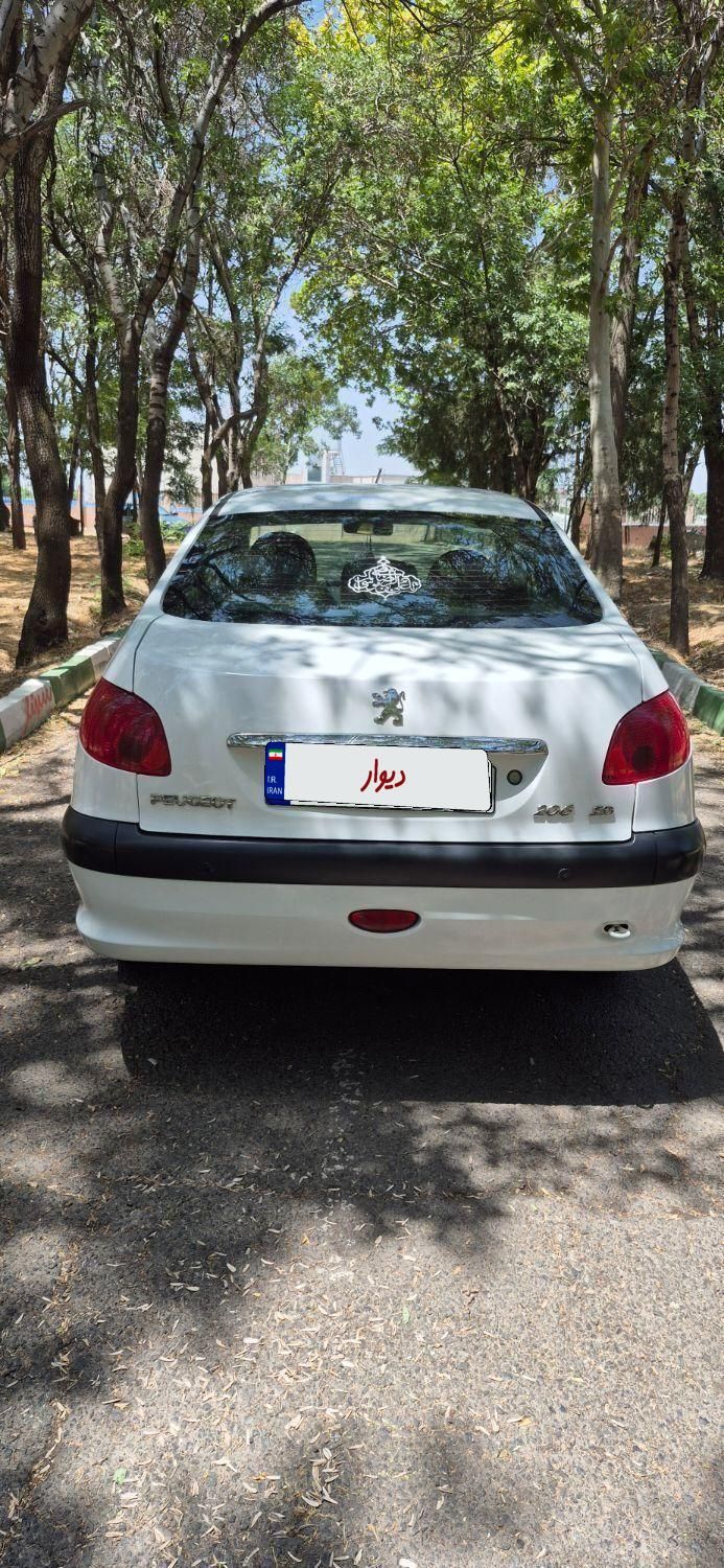 پژو ۲۰۶ صندوق دار v8 - 1397