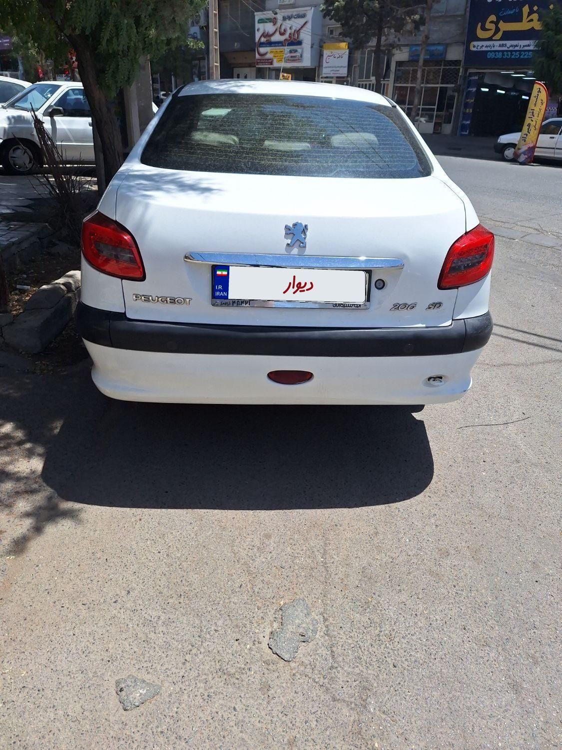 پژو ۲۰۶ صندوق دار v8 - 1394