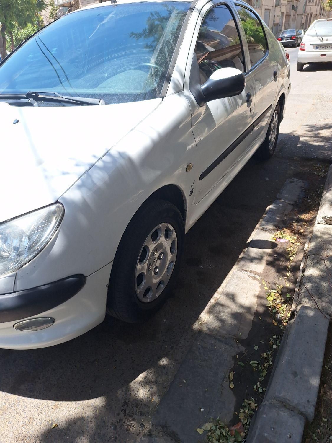 پژو ۲۰۶ صندوق دار v8 - 1394
