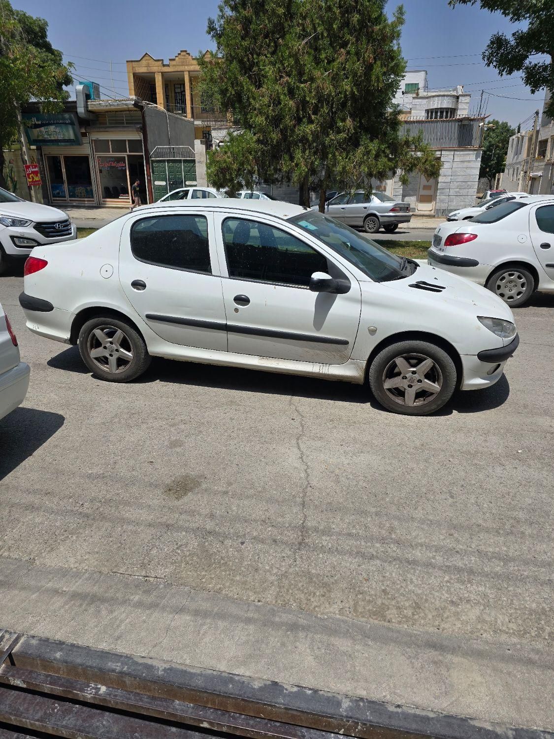 پژو ۲۰۶ صندوق دار v8 - 1395
