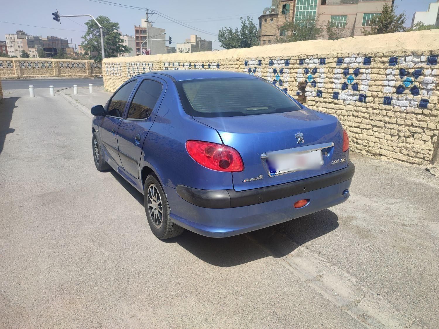 پژو ۲۰۶ صندوق دار v8 - 1395
