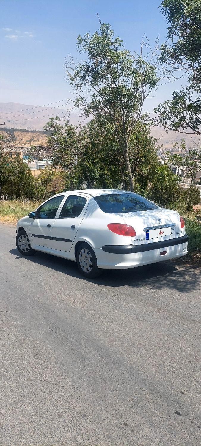 پژو ۲۰۶ صندوق دار v8 - 1394