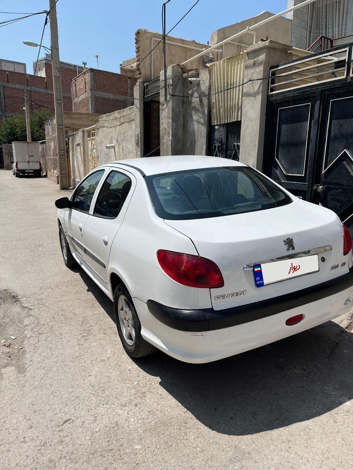 پژو ۲۰۶ صندوق دار v8 - 1390