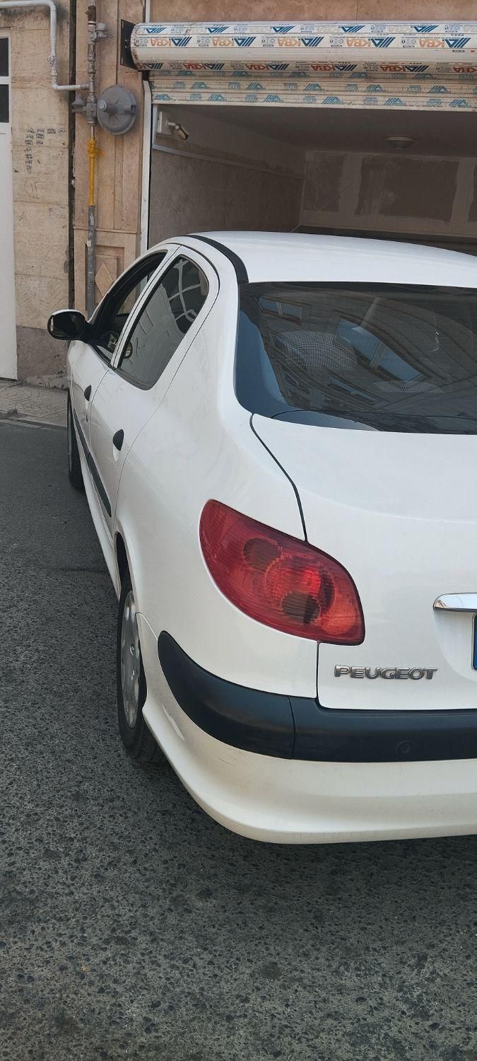 پژو ۲۰۶ صندوق دار v8 - 1394