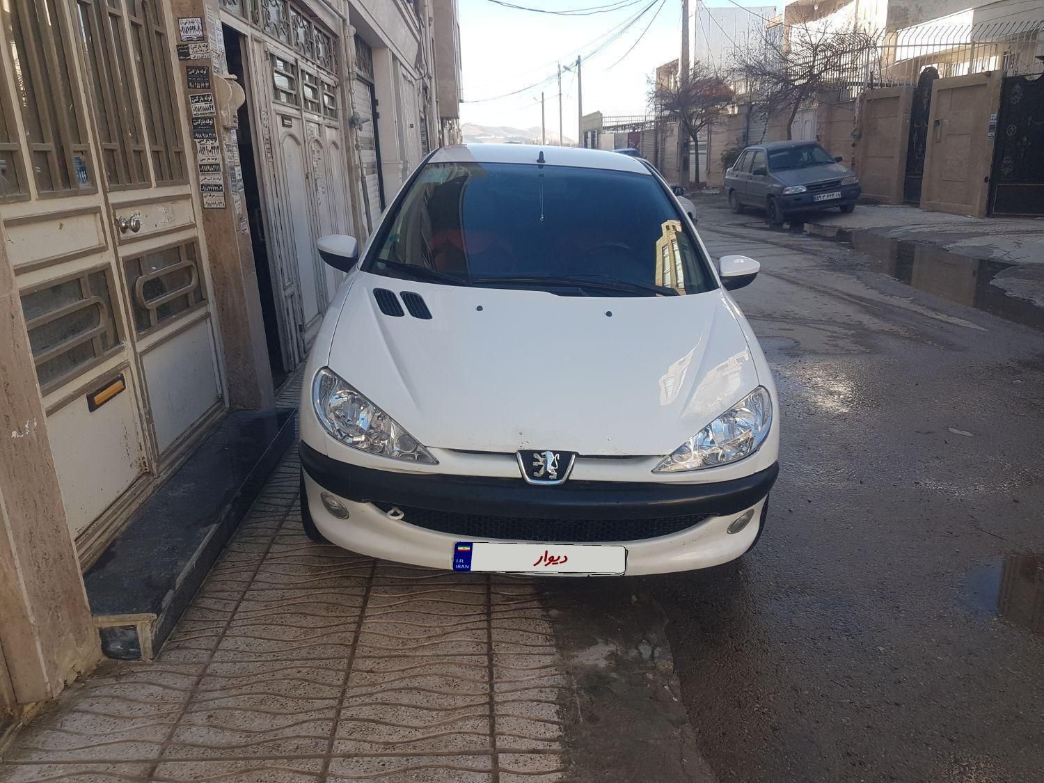 پژو ۲۰۶ صندوق دار v8 - 1397