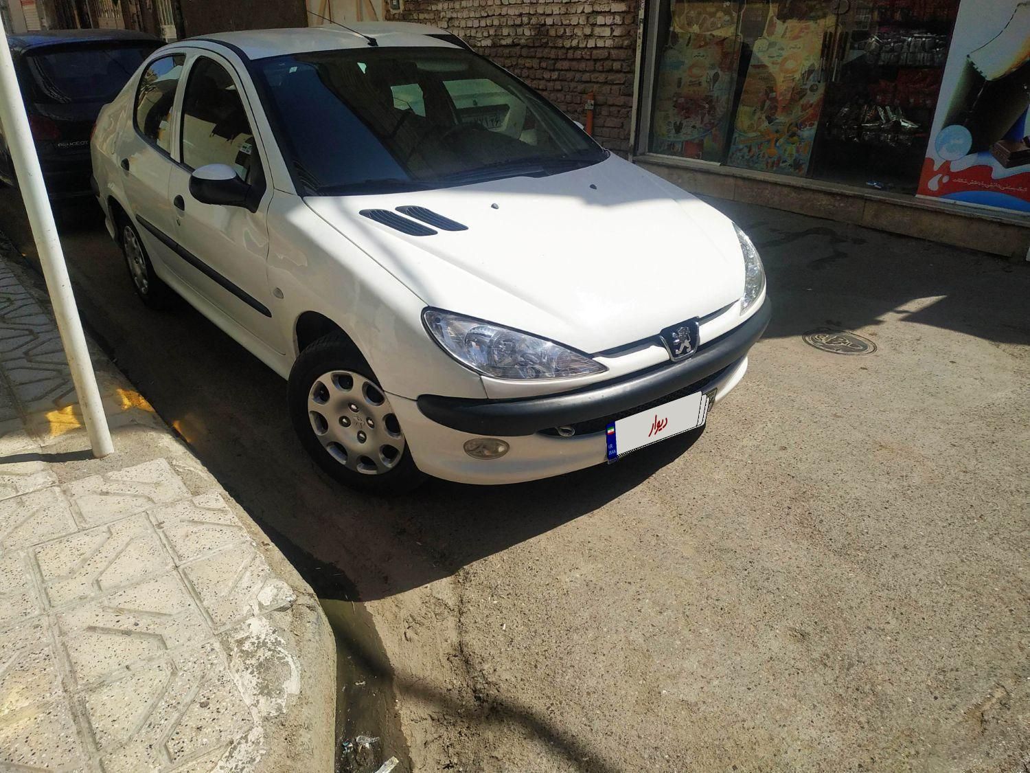 پژو ۲۰۶ صندوق دار v8 - 1396