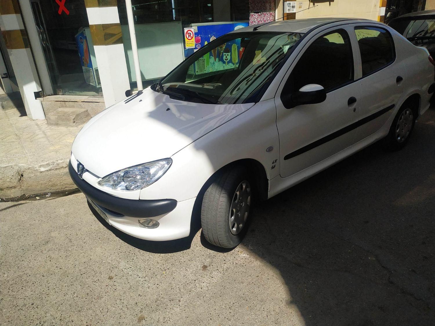 پژو ۲۰۶ صندوق دار v8 - 1396
