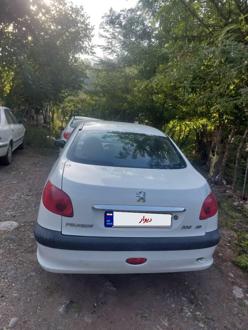 پژو ۲۰۶ صندوق دار v8 - 1396