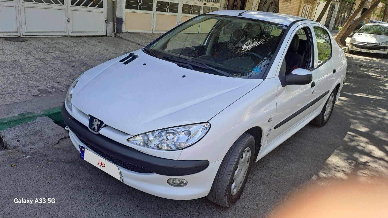 پژو ۲۰۶ صندوق دار v8 - 1396