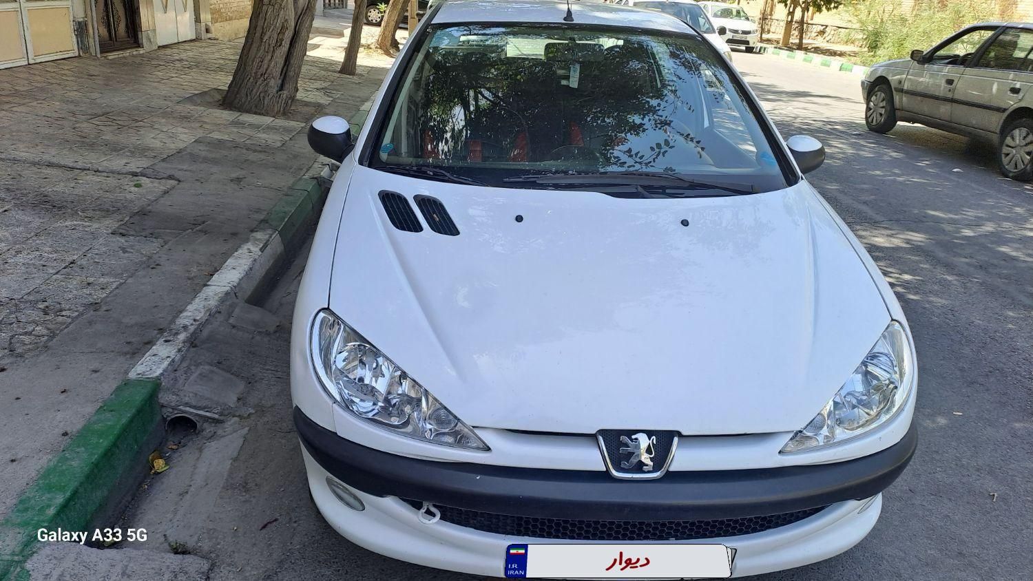 پژو ۲۰۶ صندوق دار v8 - 1396