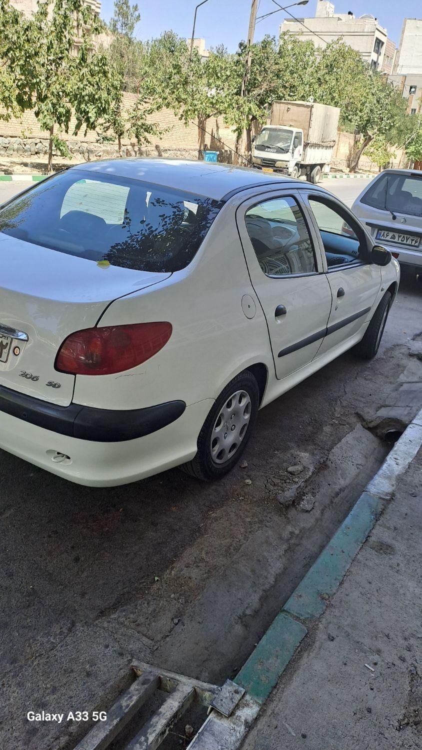 پژو ۲۰۶ صندوق دار v8 - 1396
