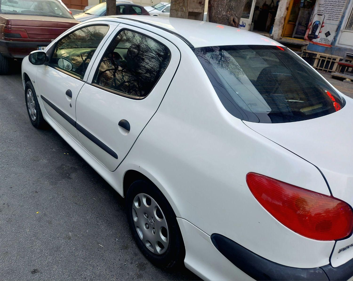 پژو ۲۰۶ صندوق دار v8 - 1397