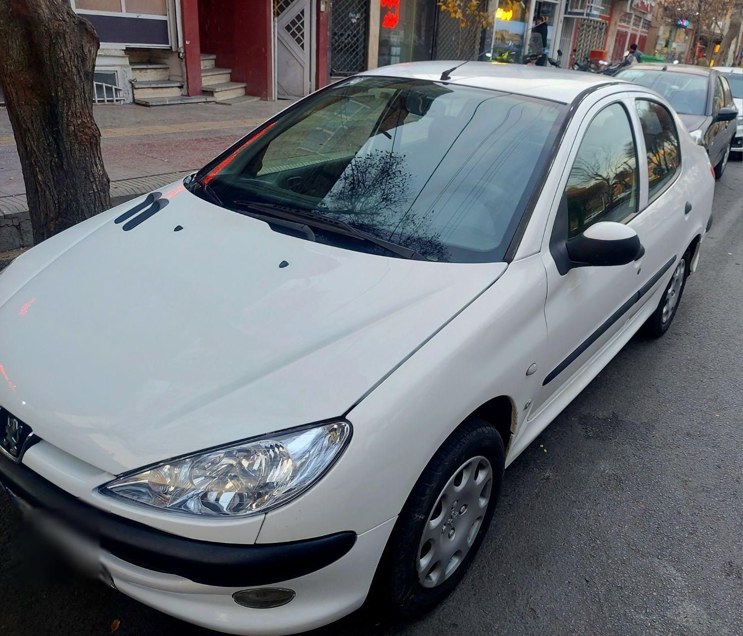 پژو ۲۰۶ صندوق دار v8 - 1397