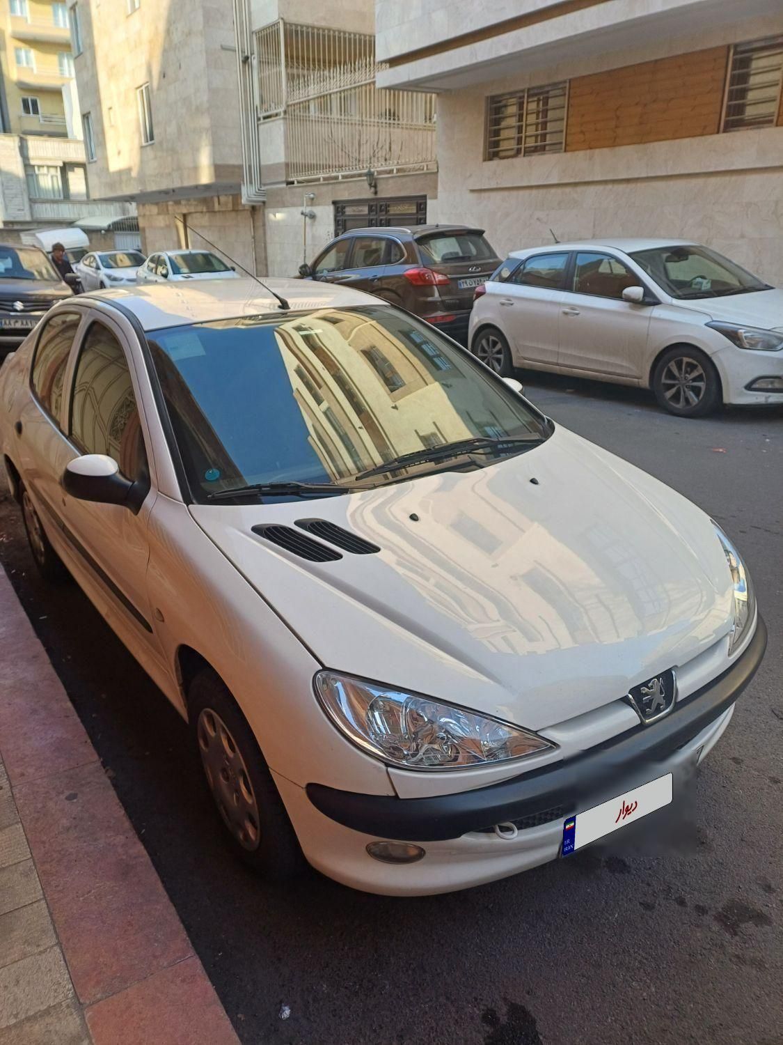 پژو ۲۰۶ صندوق دار v8 - 1397