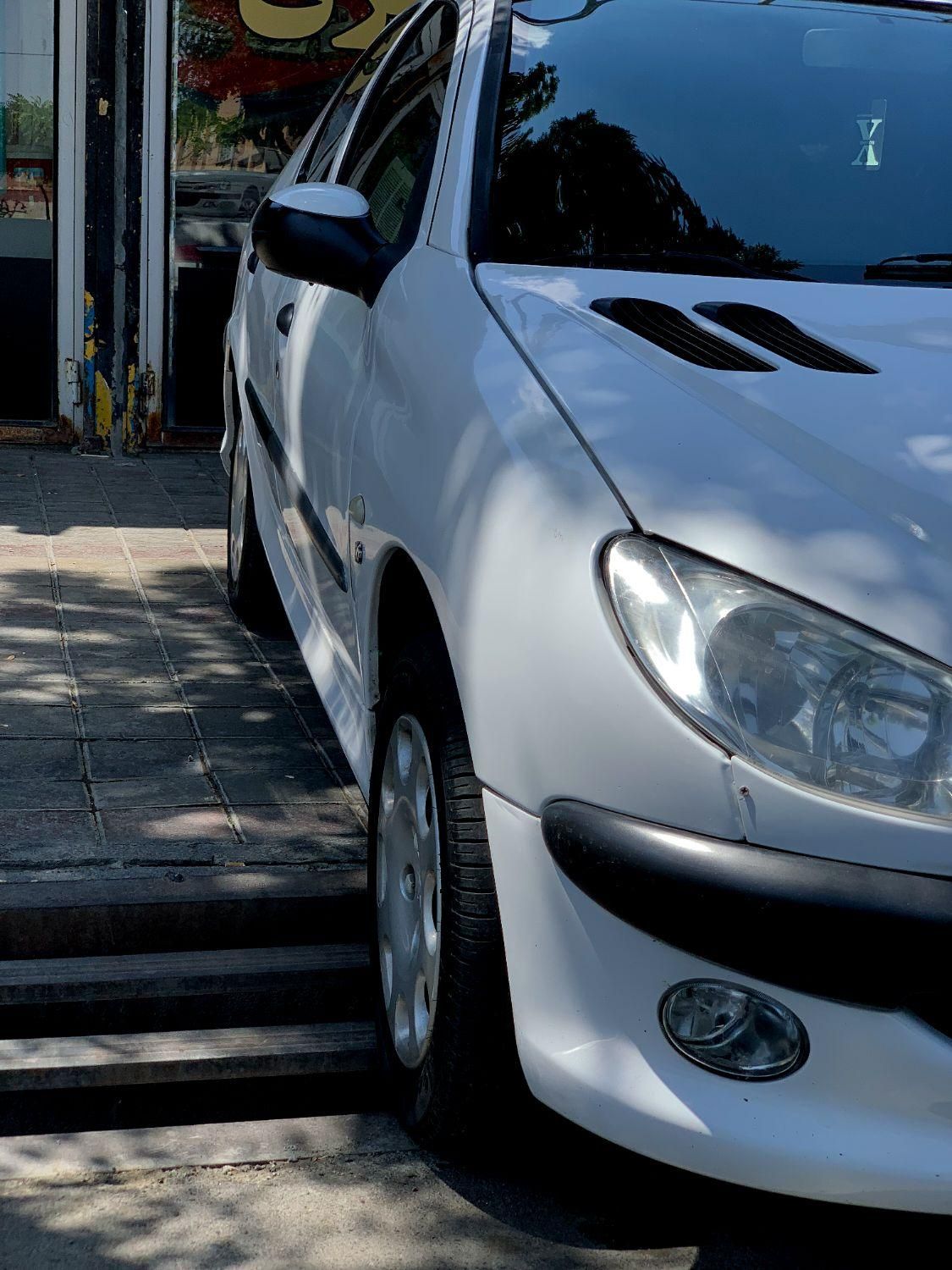 پژو ۲۰۶ صندوق دار v8 - 1396