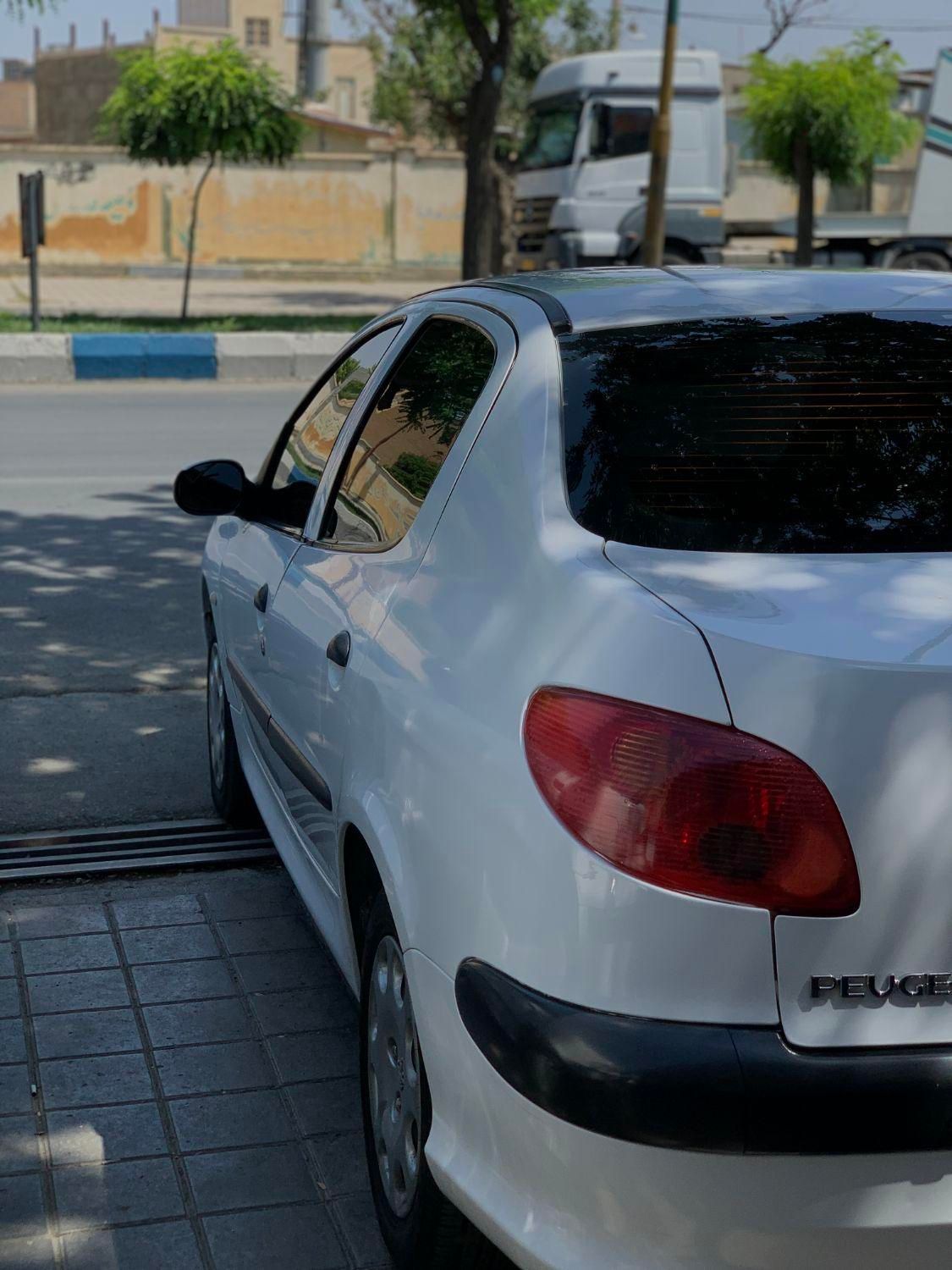 پژو ۲۰۶ صندوق دار v8 - 1396