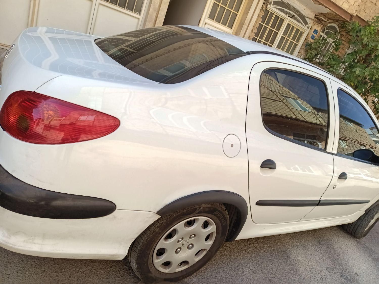 پژو ۲۰۶ صندوق دار v8 - 1391