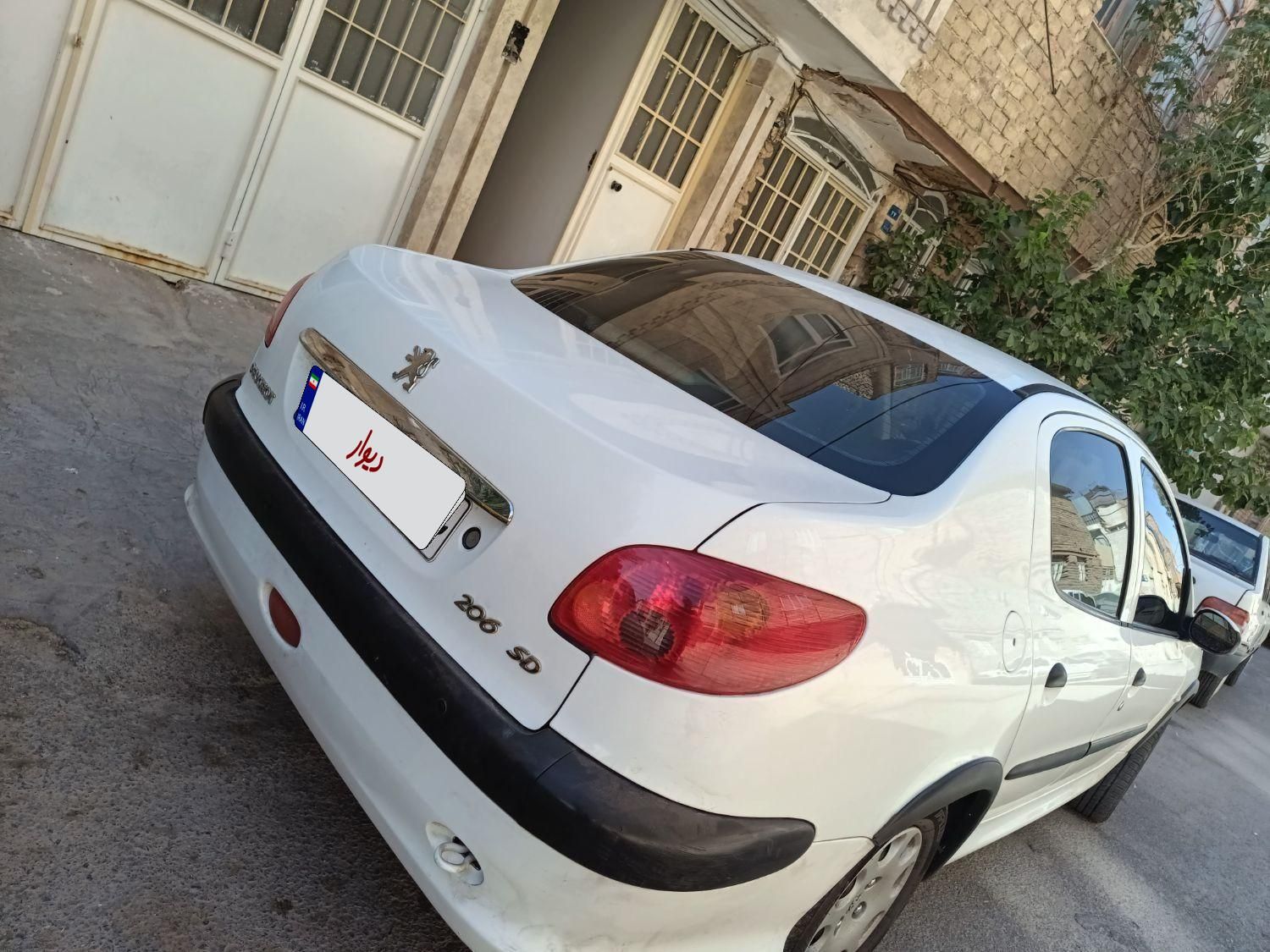 پژو ۲۰۶ صندوق دار v8 - 1391