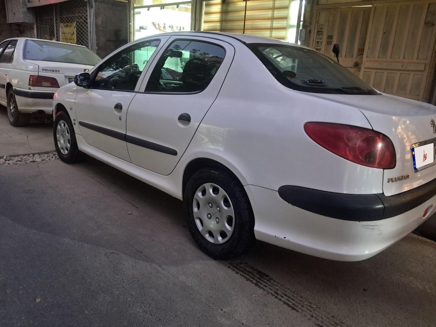 پژو ۲۰۶ صندوق دار v8 - 1395