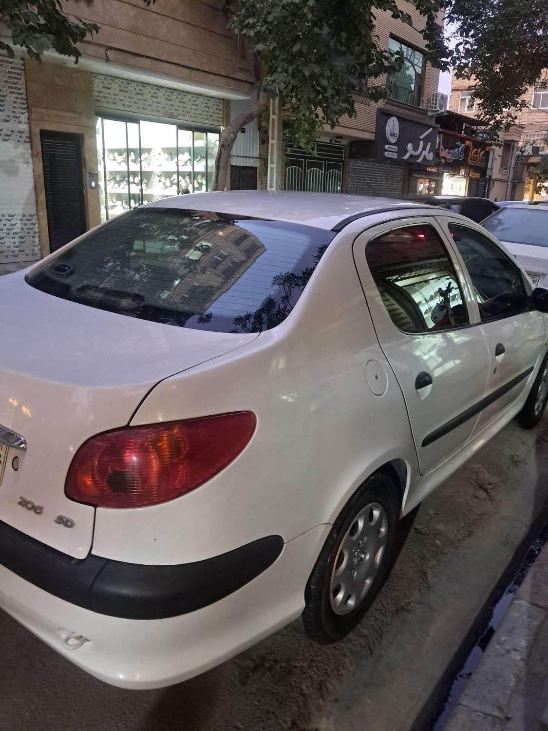 پژو ۲۰۶ صندوق دار v8 - 1395