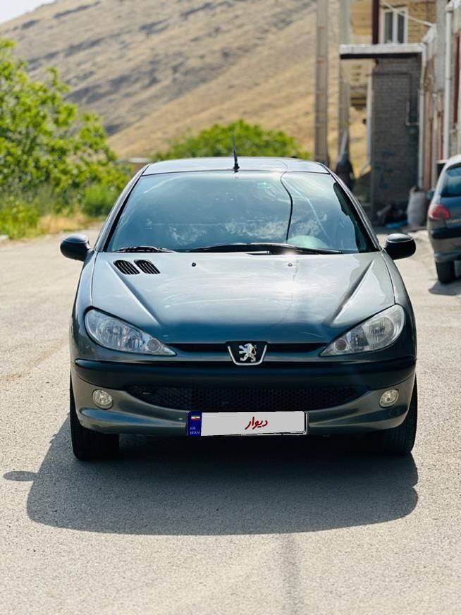پژو ۲۰۶ صندوق دار v8 - 1397