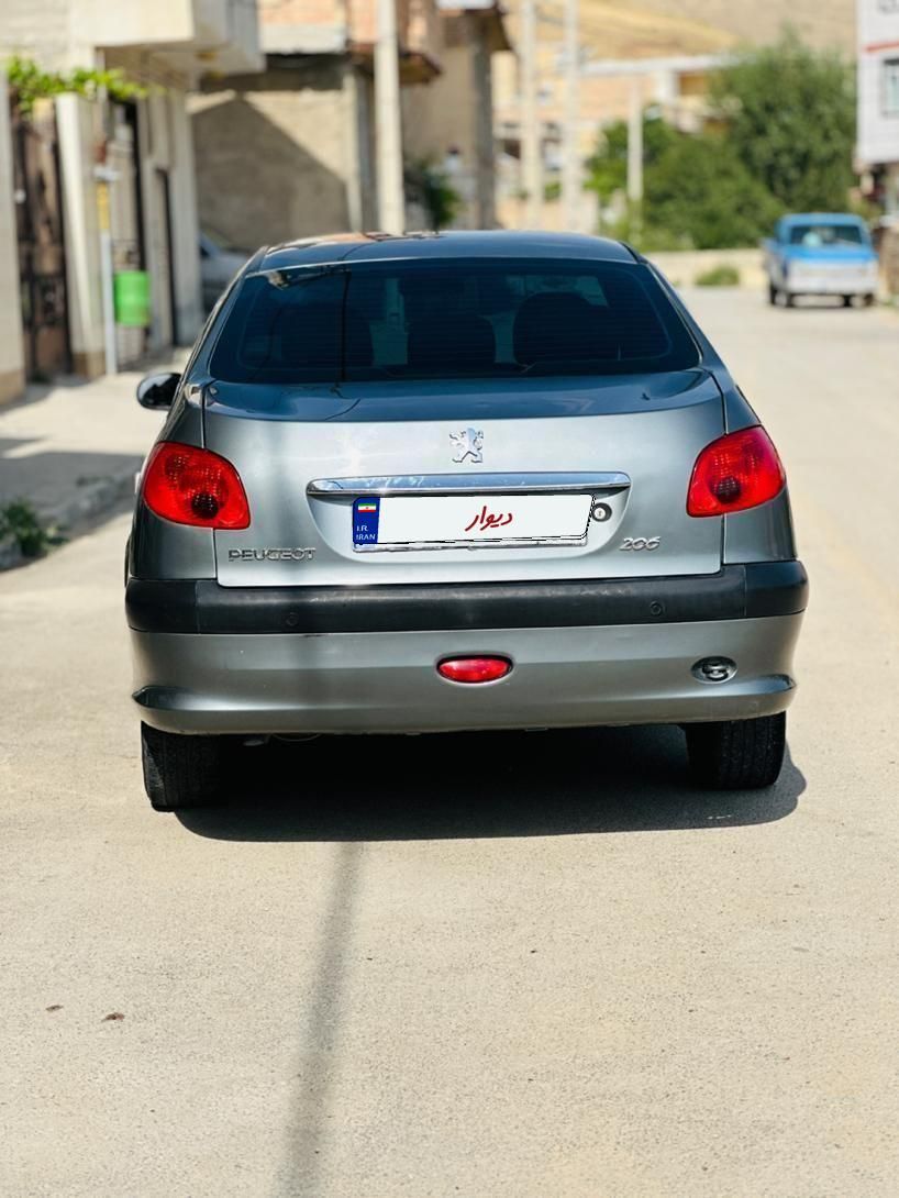 پژو ۲۰۶ صندوق دار v8 - 1397