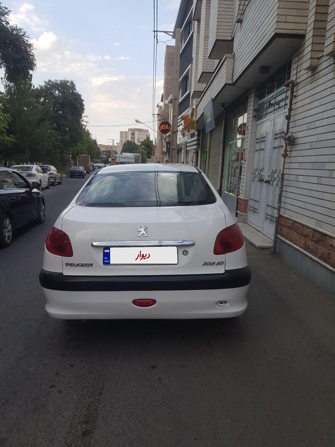 پژو ۲۰۶ صندوق دار v8 - 1393