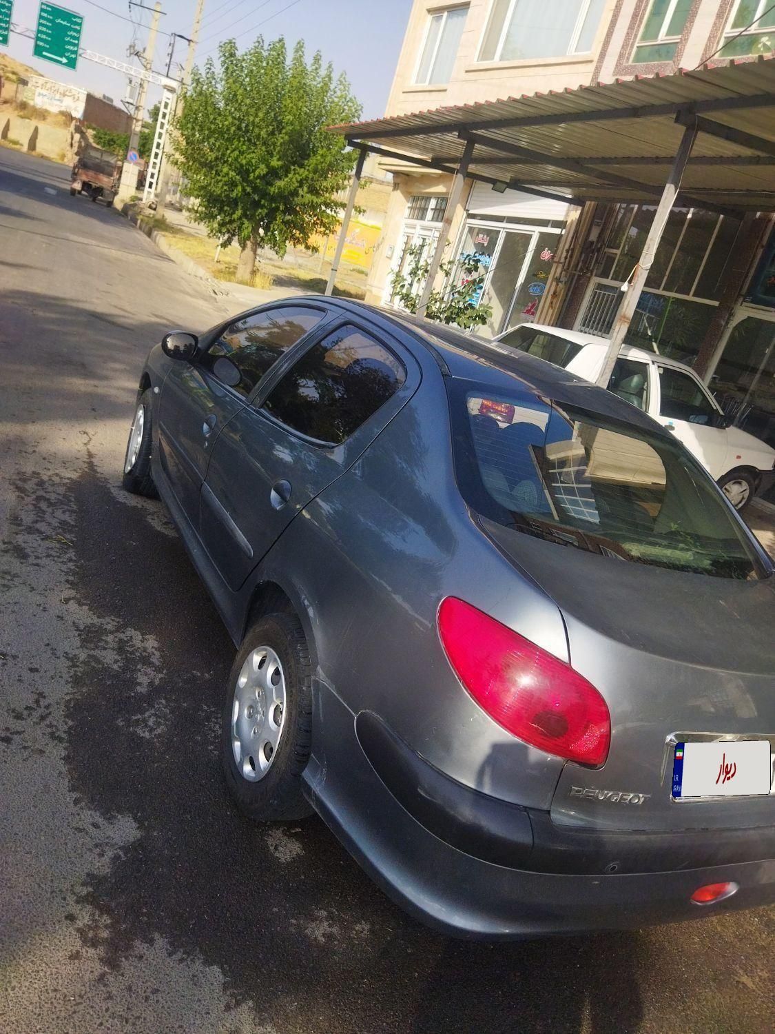 پژو ۲۰۶ صندوق دار v8 - 1393