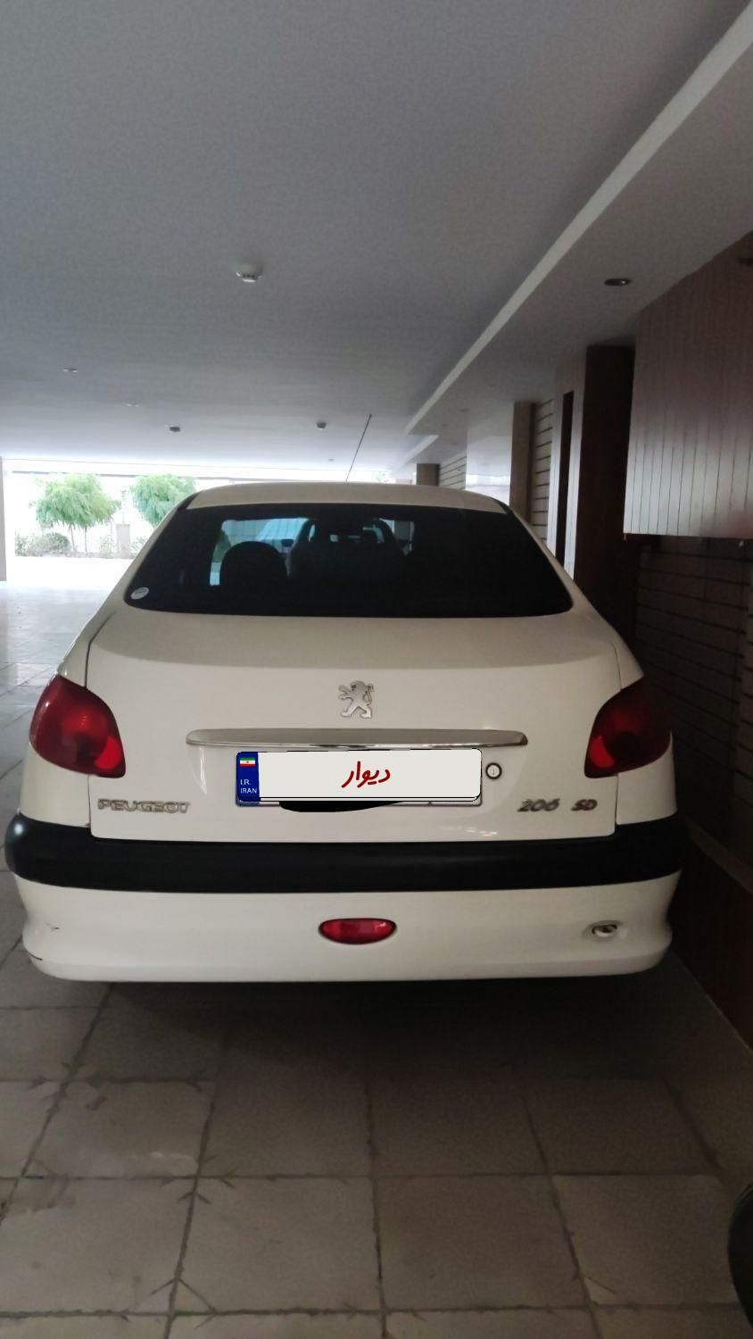 پژو ۲۰۶ صندوق دار v8 - 1391