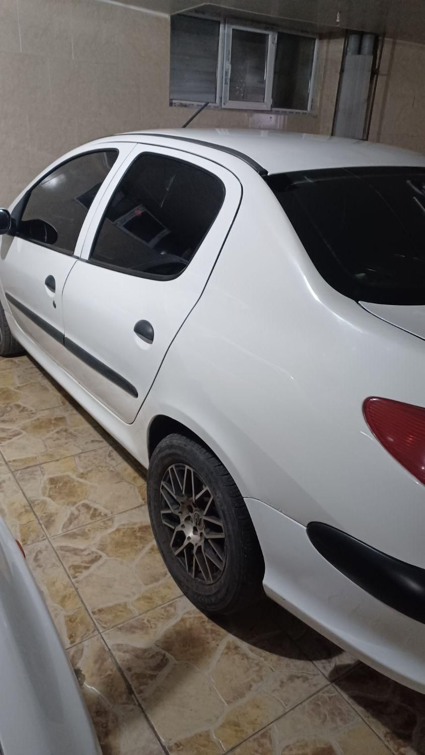 پژو ۲۰۶ صندوق دار v8 - 1394