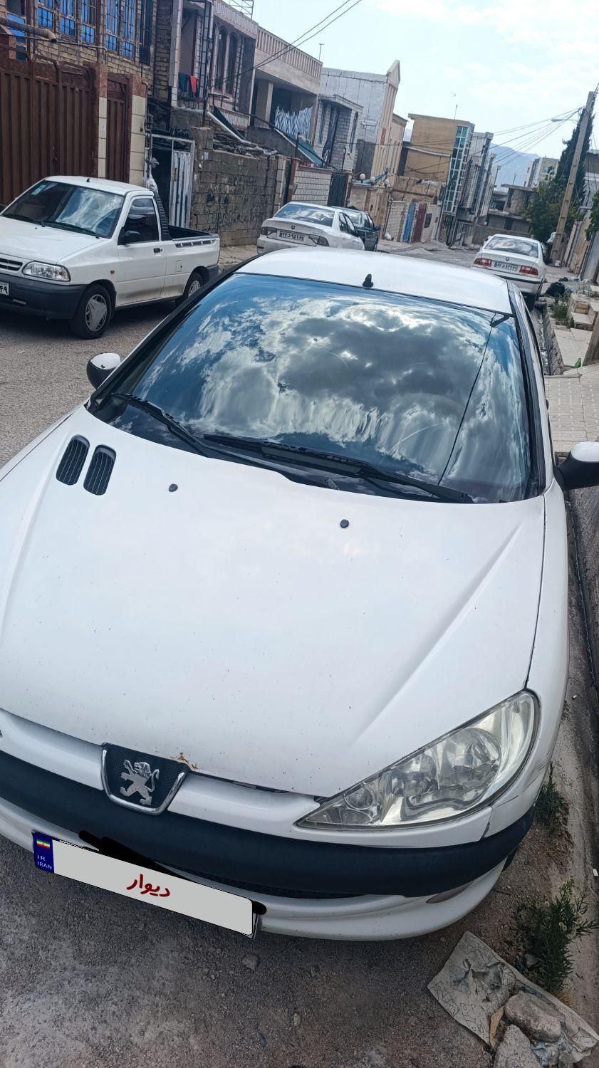 پژو ۲۰۶ صندوق دار v8 - 1393