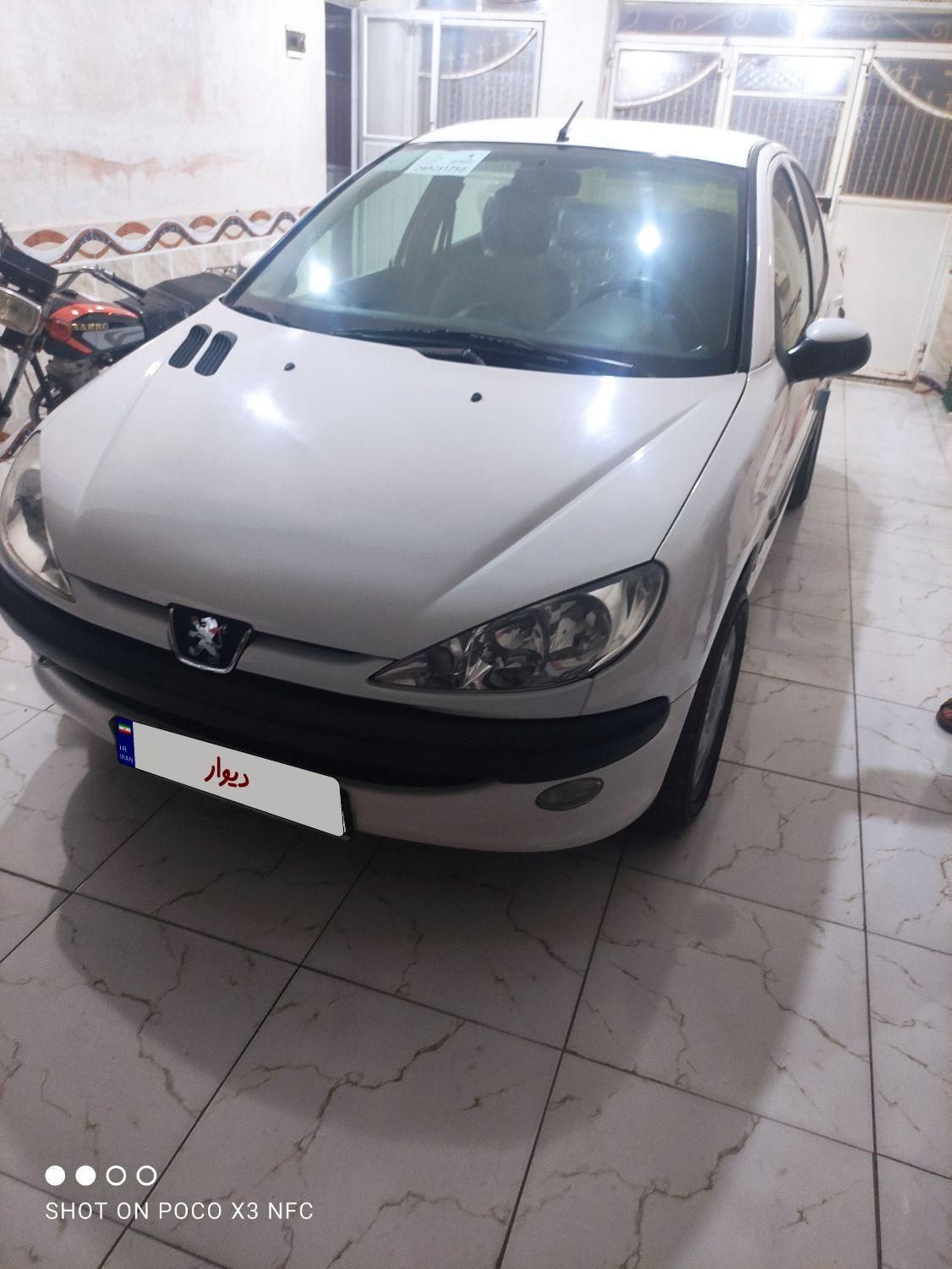 پژو ۲۰۶ صندوق دار v8 - 1396